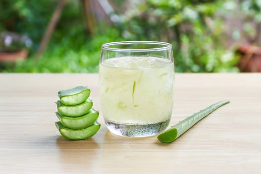 Aloe Vera for drinking on wood table 