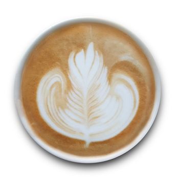 Top view of a mug of latte art coffee isolted on white background.