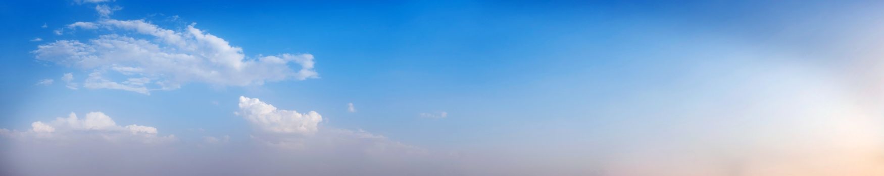 Vibrant color panoramic sky with cloud on a sunny day. Beautiful cirrus cloud. Panorama high resolution photograph.