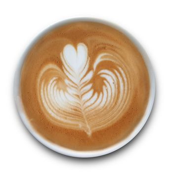 Top view of a mug of latte art coffee isolted on white background.