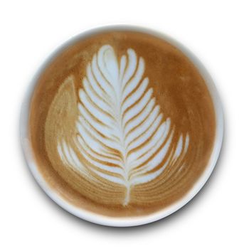 Top view of a mug of latte art coffee isolted on white background.