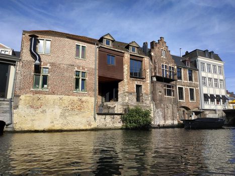 Ghent, Belgium casual view on the buildings streets and roads with tourists walking around