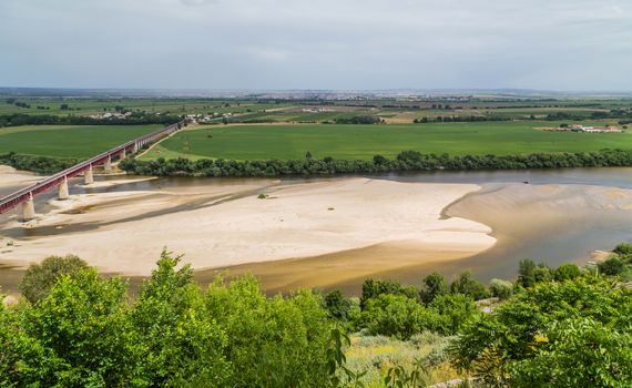 Santarem, Portugal. Ponte Dom Luis I Bridge, Tagus River and Leziria fields the fertile alluvial plain of Ribatejo. Seen from Portas do Sol viewpoint