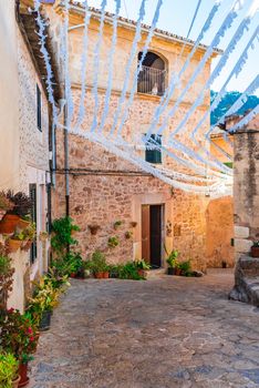 Idyllic street in the mediterranean village of Valldemossa on Majorca, Spain