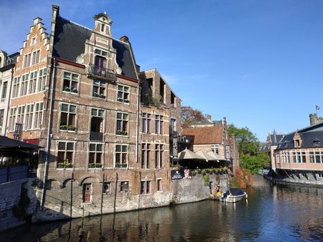 Ghent, Belgium casual view on the buildings streets and roads with tourists walking around