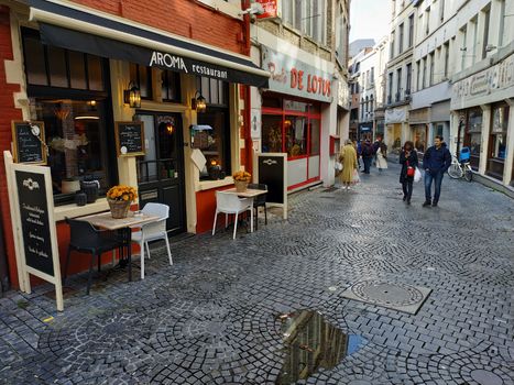 Ghent, Belgium - November 02, 2019: view on the streets and roads with tourists walking around