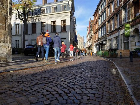 Ghent, Belgium - November 02, 2019: view on the streets and roads with tourists walking around