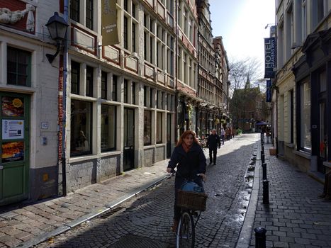 Ghent, Belgium - November 02, 2019: view on the streets and roads with tourists walking around