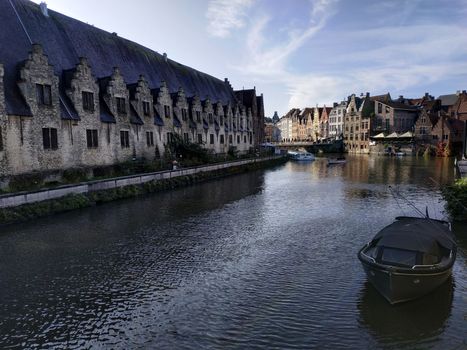 Ghent, Belgium casual view on the buildings streets and roads with tourists walking around