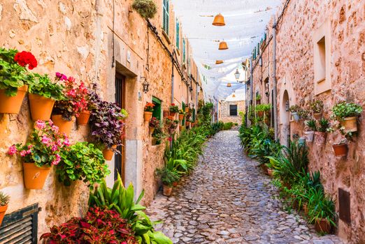 Beautiful street in the old village of Valldemossa on Mallorca island, Spain