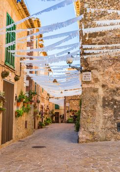 Alley in old mediterranean village of Valldemossa, Mallorca Spain
