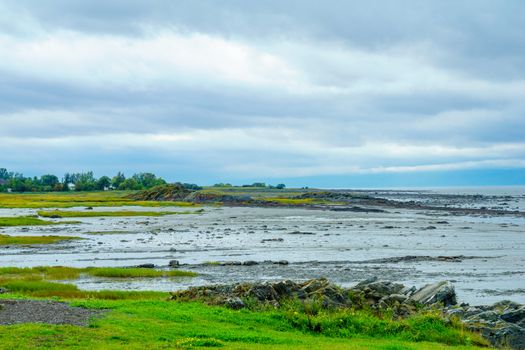 Foggy view of the Saint Lawrence River in Saint-Roch-des-Aulnaies, Quebec, Canada