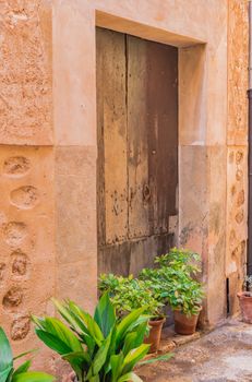 Close-up of old wooden front door residence entrance