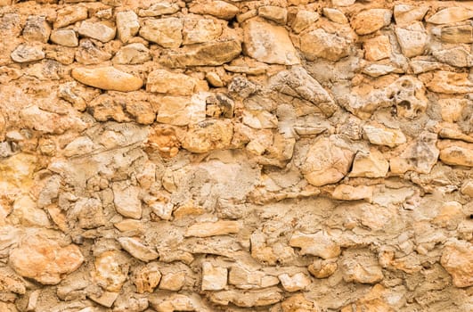 Old stone wall background texture, structure close-up

