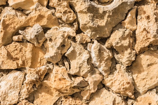 Stone wall background texture, structure close-up