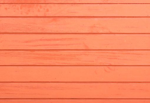 Red painted wooden planks background texture with copy space