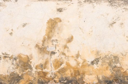 Close-up of damaged wall plaster background texture