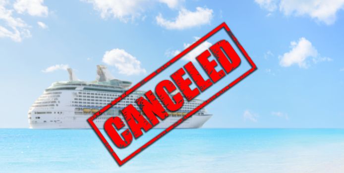 Cruise ship travel holidays canceled because of coronavirus or other reason. Crisis in the cruise industry due to corona virus covid-19 or other reason. Canceled red stamp text on cruise ship.