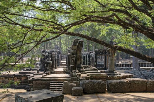 Angkor Thom, Cambodia, March 2016: Minor structures in the gardens around the Baphuon temple mountain. reconstructed by archaeologists over 16 years following the khmer rouge conflict