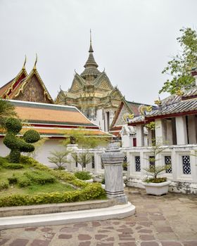 Thailand, Bangkok - March 2016: Decorative tiled stupa at Wat Pho, rise above the compound walls