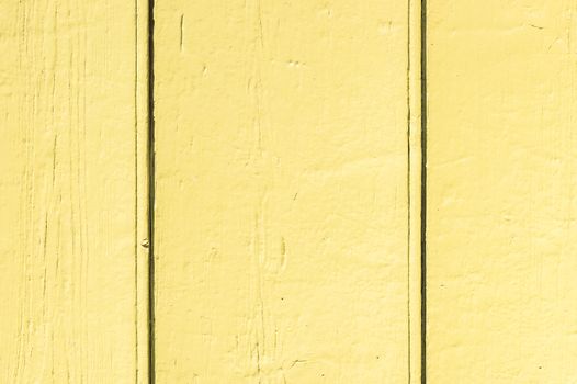 Yellow painted wood planks background texture with copy space