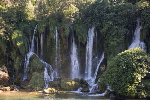 Bosnia and Herzegovina, Kravica Waterfalls - June 2018: Popular with tourists Kravica waterfall is a large tufa cascade on the Trebižat River, in the karstic heartland of Herzegovina