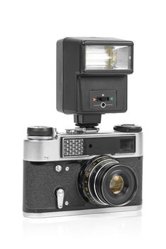 Vintage analog camera with manual flash light isolated on white background with clippinng path