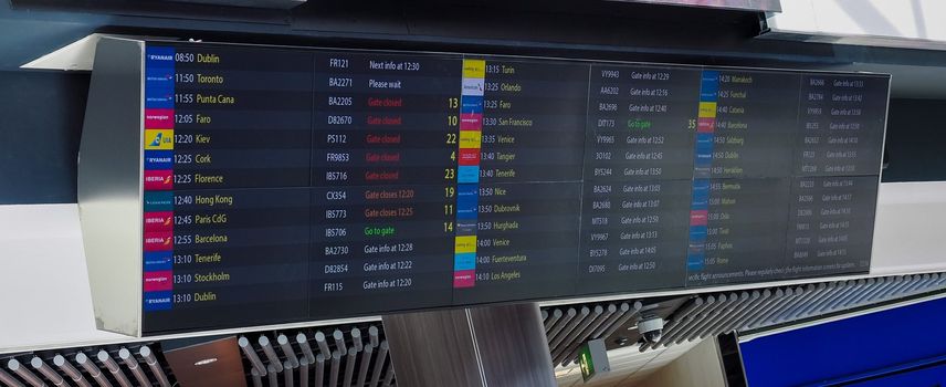 GATWICK, UK - CIRCA SEPTEMBER 2019: Departures timetable at London Gatwick Airport