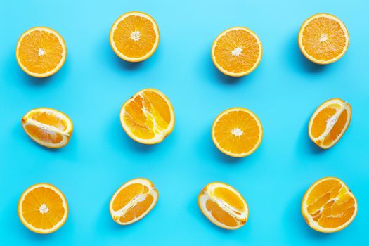 High vitamin C, Juicy and sweet. Fresh orange fruit  on blue background. Top view