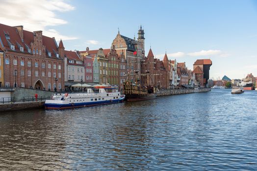 Passenger ships moored in pier at Motlawa river in Gdansk old town, Poland