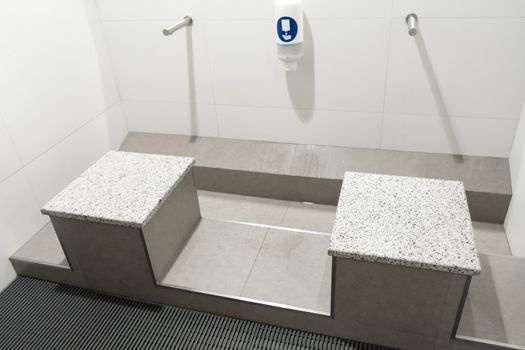 Stylish touchless washstand in a public toilet