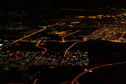 The view from the plane to the night city
