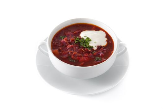 Traditional Ukrainian Russian borsch. Beetroot soup isolated on white background