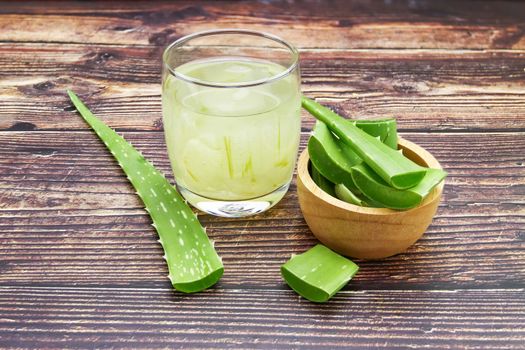 Aloe Vera for drinking on wood table 