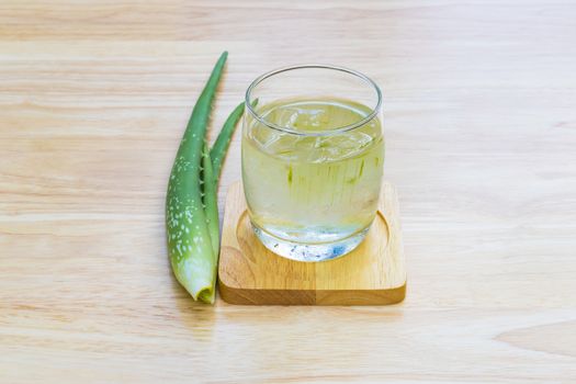 Aloe Vera for drinking on wood table 