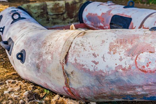 Close-up of old grunge inflatable rubber boat