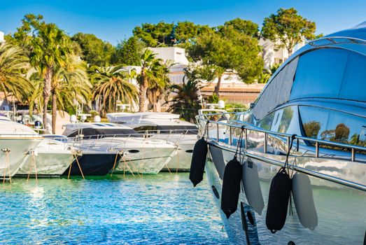 Luxury boats anchored at marina of Cala D'or on Majorca island, Spain