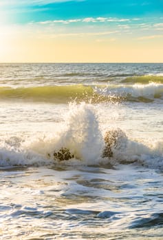 View of wavy seascape with beautiful light