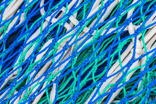 Close-up of blue fishing nets pattern background 