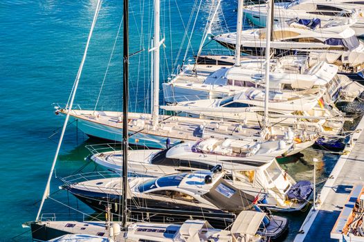 Luxury yachts boats anchored at marina, view from above