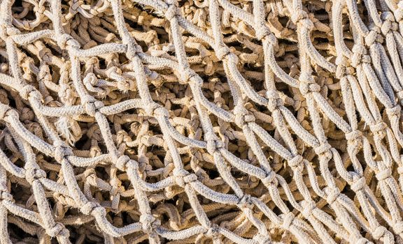 Close-up of vintage fish net maritime background texture