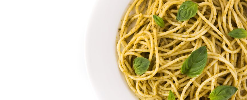 Spaghetti pasta with pesto sauce isolated on white background