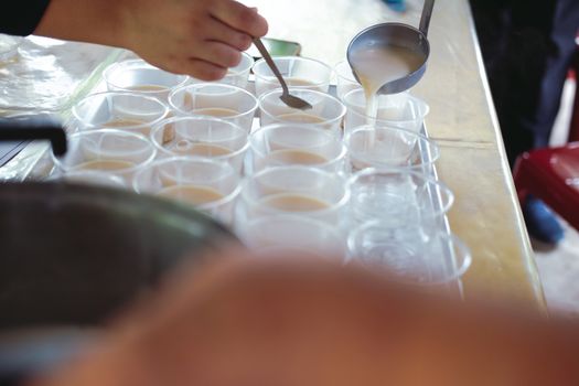 soy milk pudding in plastic cup. vegan dessert for vegetarian