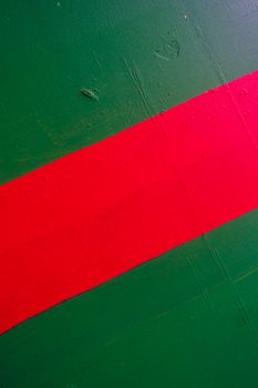 a red and green stripe on a metal pole UK
