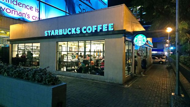 QUEZON CITY - JAN 3 - Starbucks coffee facade at SM santa mesa branch on January 3, 2017 in Quezon City, Philippines.