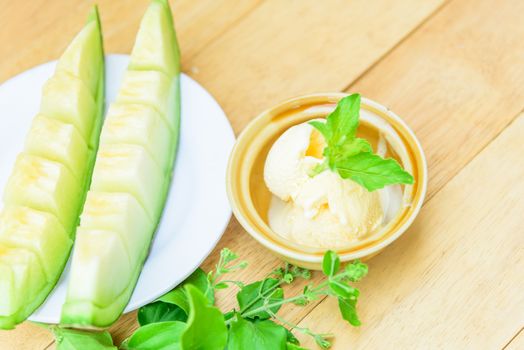 ice cream melon on wood table