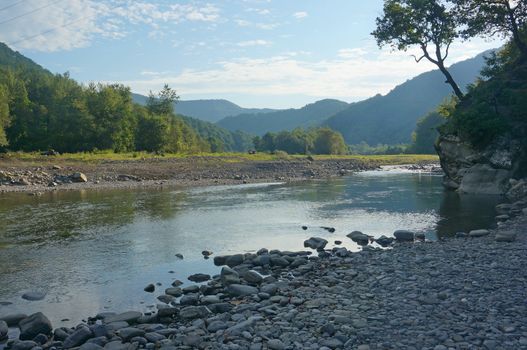 Mountain river and mountains in the morning