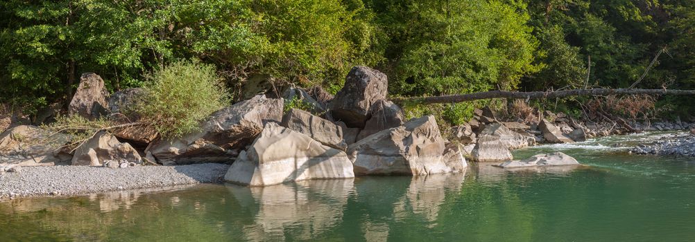 Coast of mountain river in the Caucasus 