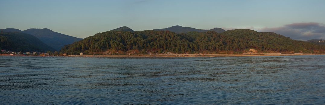 View on the mountains of Caucasus from the Black Sea at sunset