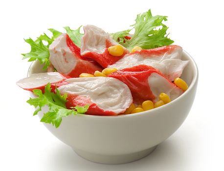 Crab meat with fresh green lettuce and corn in the bowl